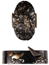 Polished Shakudo Fuchikashira Decorated with Raijin - Thunder God