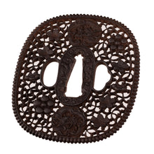 Iron Nanban School Tsuba Decorated with Dragon, Plum Blossom and Umebachi Kamon