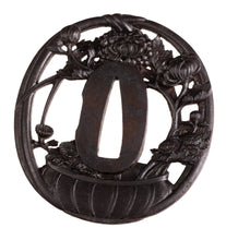 Iron Sukashi Choshu School Tsuba Decorated with Flower Arrangement