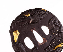 Iron Tsuba Decorated with Dragon and Waves