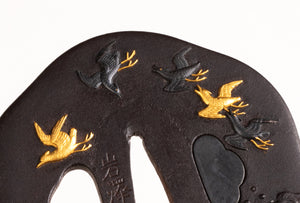 Iron Tsuba Signed "Iwasawa Ryochin" decorated with Waves and Birds