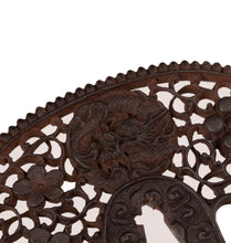Iron Nanban School Tsuba Decorated with Dragon, Plum Blossom and Umebachi Kamon