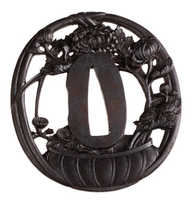 Iron Sukashi Choshu School Tsuba Decorated with Flower Arrangement