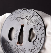 Shakudo Tsuba Signed "Shigeyoshi" - Decorated with Shishi and Peony