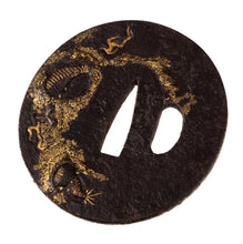Iron Jakushi School Tsuba Decorated with a Dragon