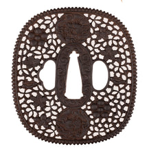Iron Nanban School Tsuba Decorated with Dragon, Plum Blossom and Umebachi Kamon