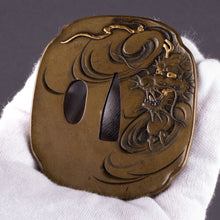 Shinchu Otsuki School Tsuba Decorated with a Dragon